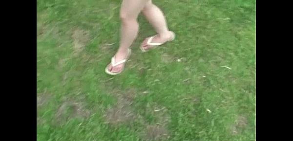 Young teen plays in the park and flashes her body
